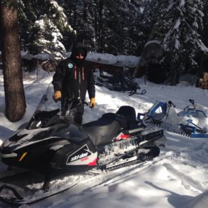 trail grooming with snowmobile